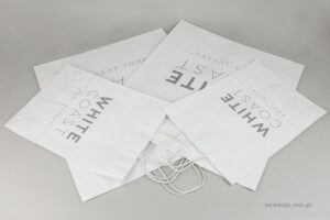 White Coast Pool Suites: NewMan printed paper carrier bags for Milos’s hotel suites.