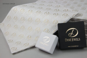 Duke Jewels: Gold printing on boxes and tissue paper.