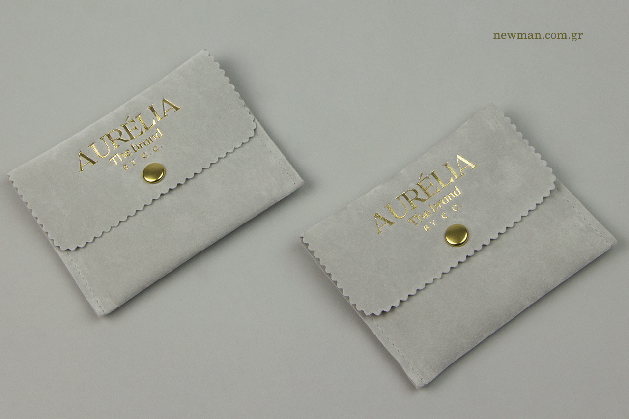 Suede jewellery pouches with logo.