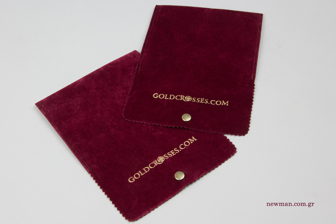 Bordeaux suede pouches with gold hot-foil printing.