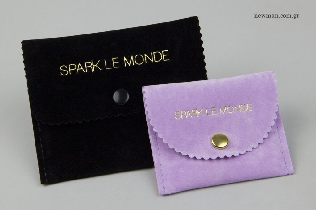 SPARK LE MONDE: NewMan packaging with logo.