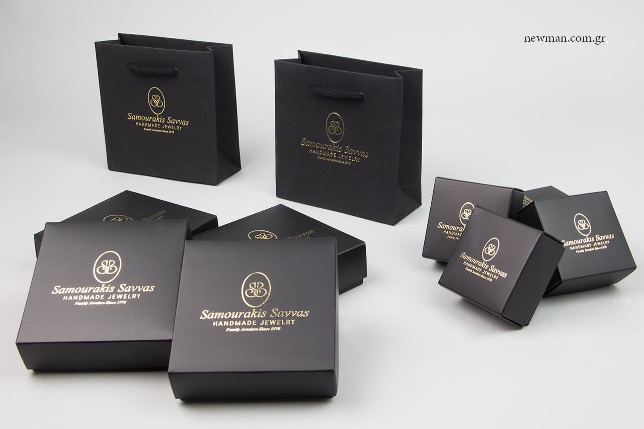 Printed gift bags and packaging boxes with logo.