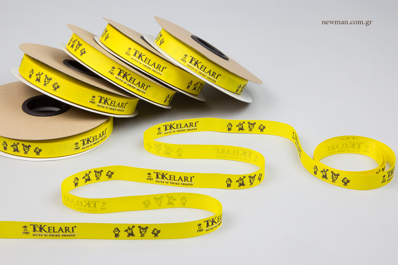 Brown and white printing on yellow grosgrain ribbons.