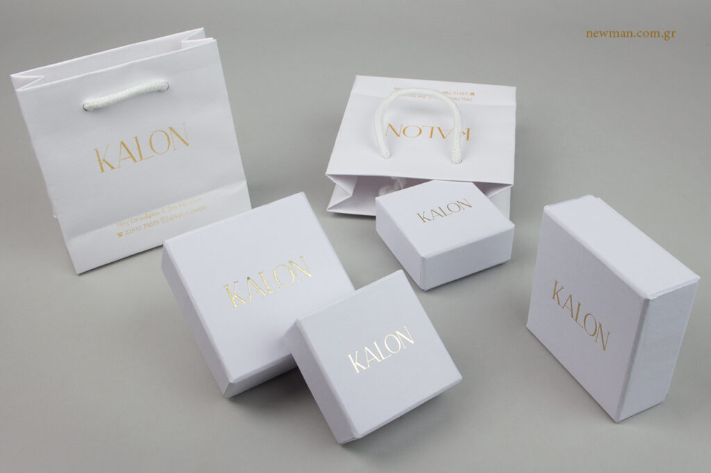 Kalon jewels: White jewellery packaging with gold corporate name printing.