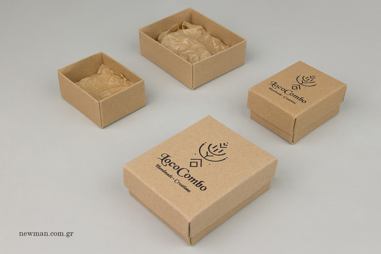 Kraft bijoux boxes with inner tissue paper.