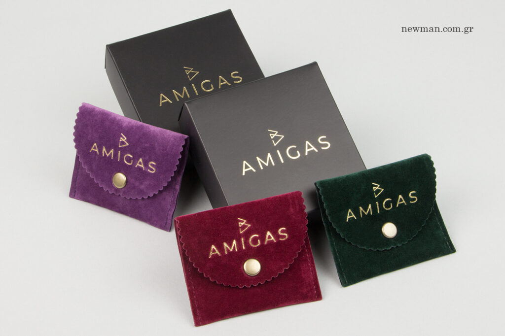 Amigas: Gold hot-foil printing on wholesale branded packaging.