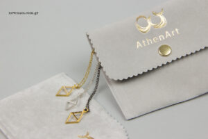 Athenart: NewMan jewellery pouches with logo.