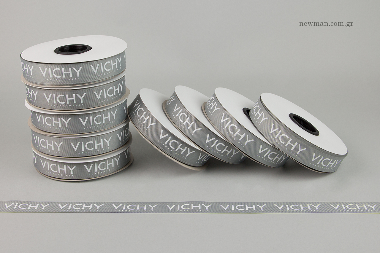 Wholesale packaging ribbons with white printing.