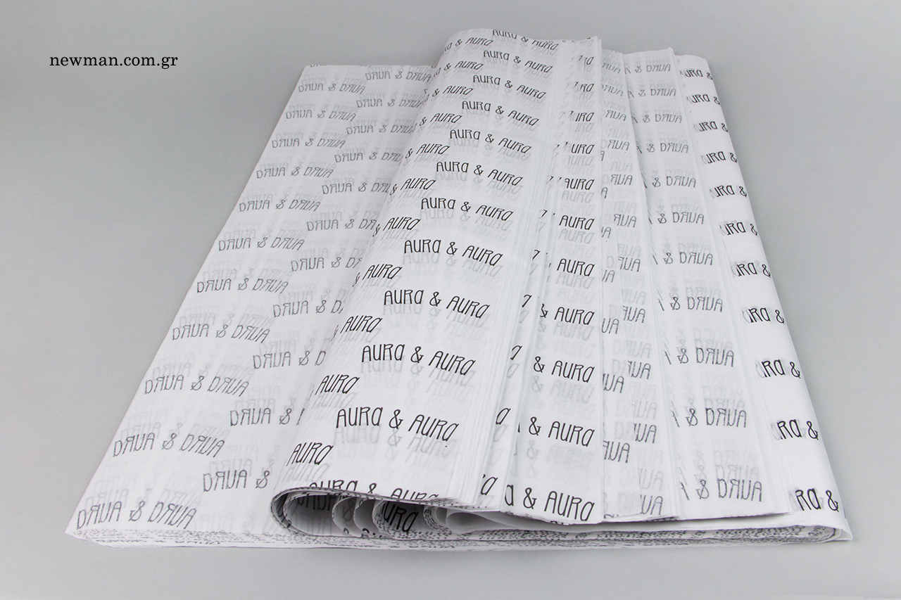 Printed tissue paper with corporate name.