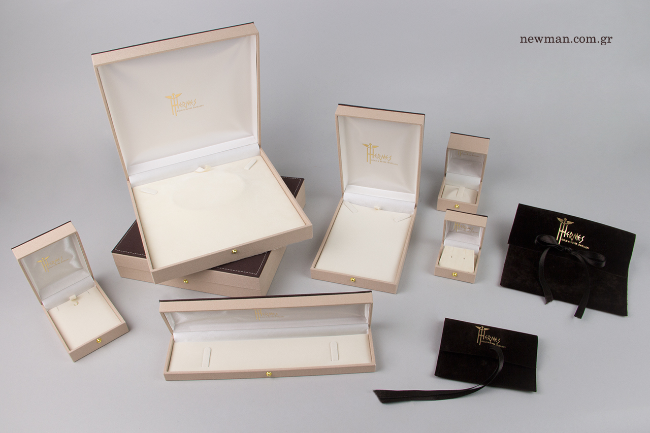 Gold hot-foil printing on jewellery boxes and suede pouches.