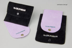 Noxpiria: Iridescent logo on suede jewellery pouches