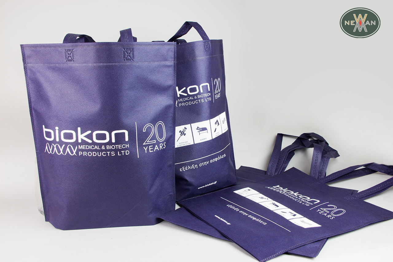 Non-woven packaging bags with white silk-screen printing.