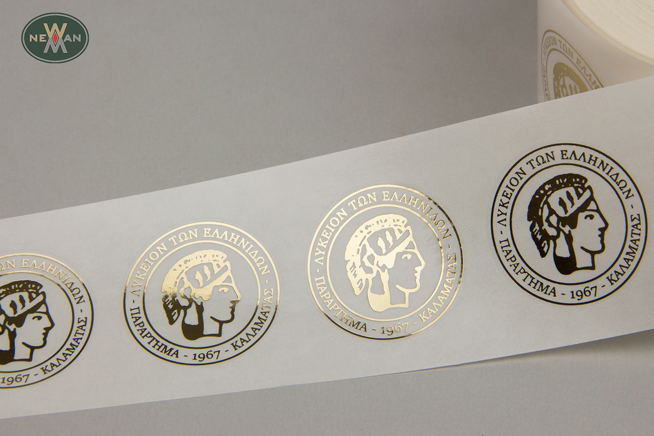Gold hot-foil printing on round packaging sticky labels.