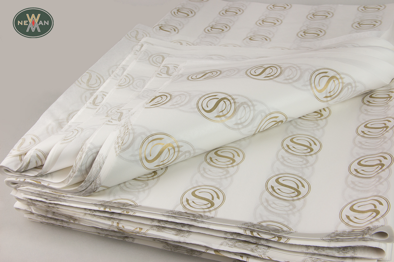 Wholesale packaging tissue paper with corporate name printing.