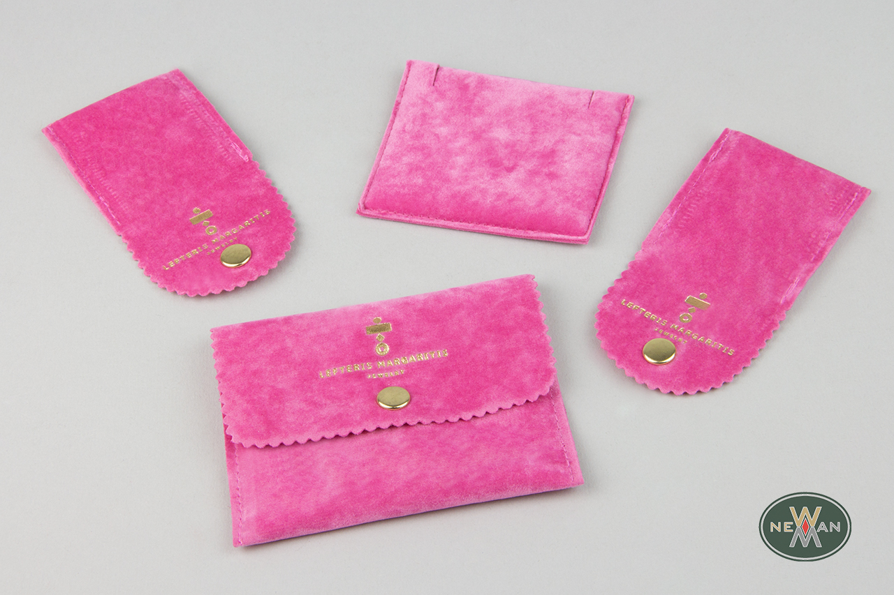 Suede jewelry packaging with inner suede pad.