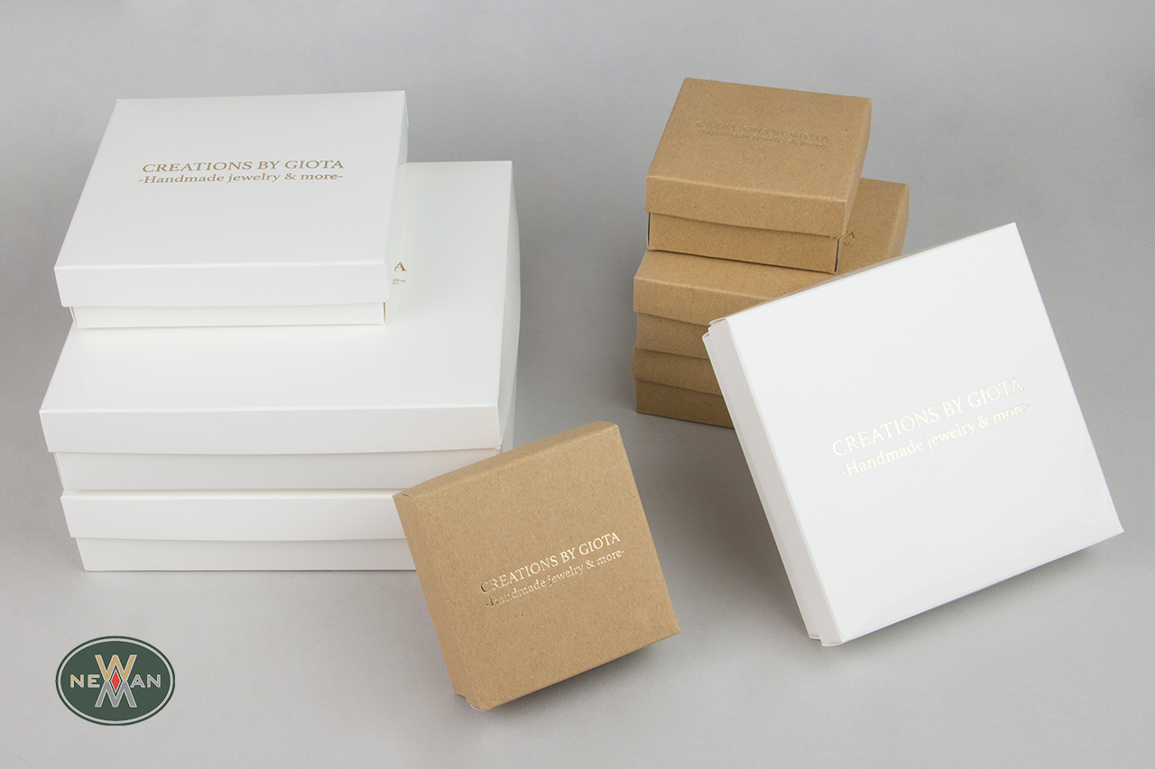 Gold hot-foil printing on paper packaging boxes.