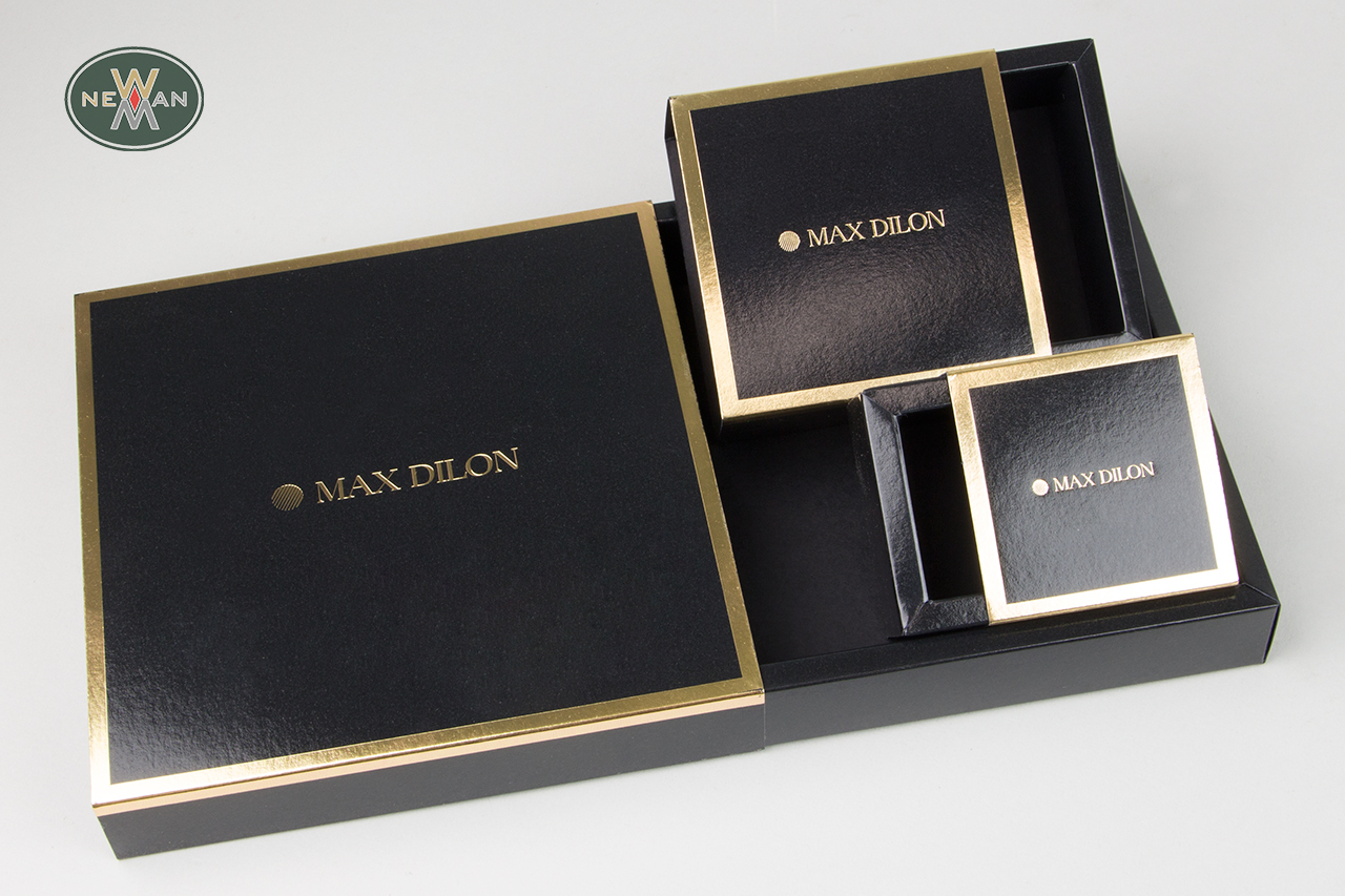 NewMan slider matchbox-type boxes upon custom order.
