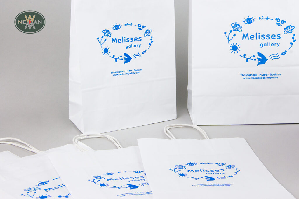 Melisses Gallery: Μπλε εταιρικό τύπωμα σε χάρτινες οικολογικές σακούλες καταστήματος.