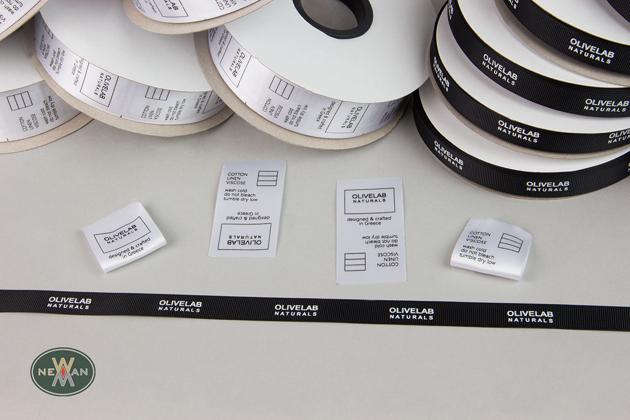 Corporate clothing label tags – woven labels for clothes.