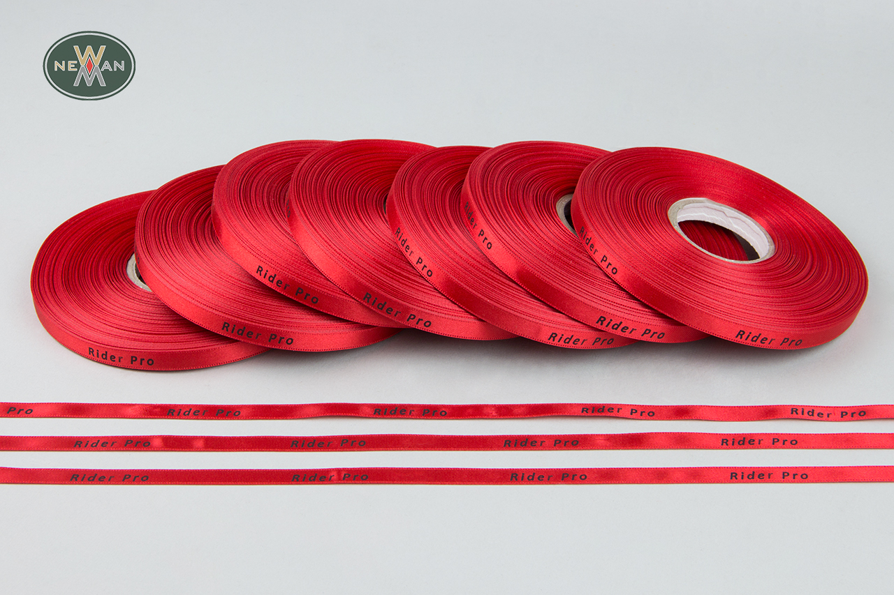 Satin packaging ribbon with logo printing.